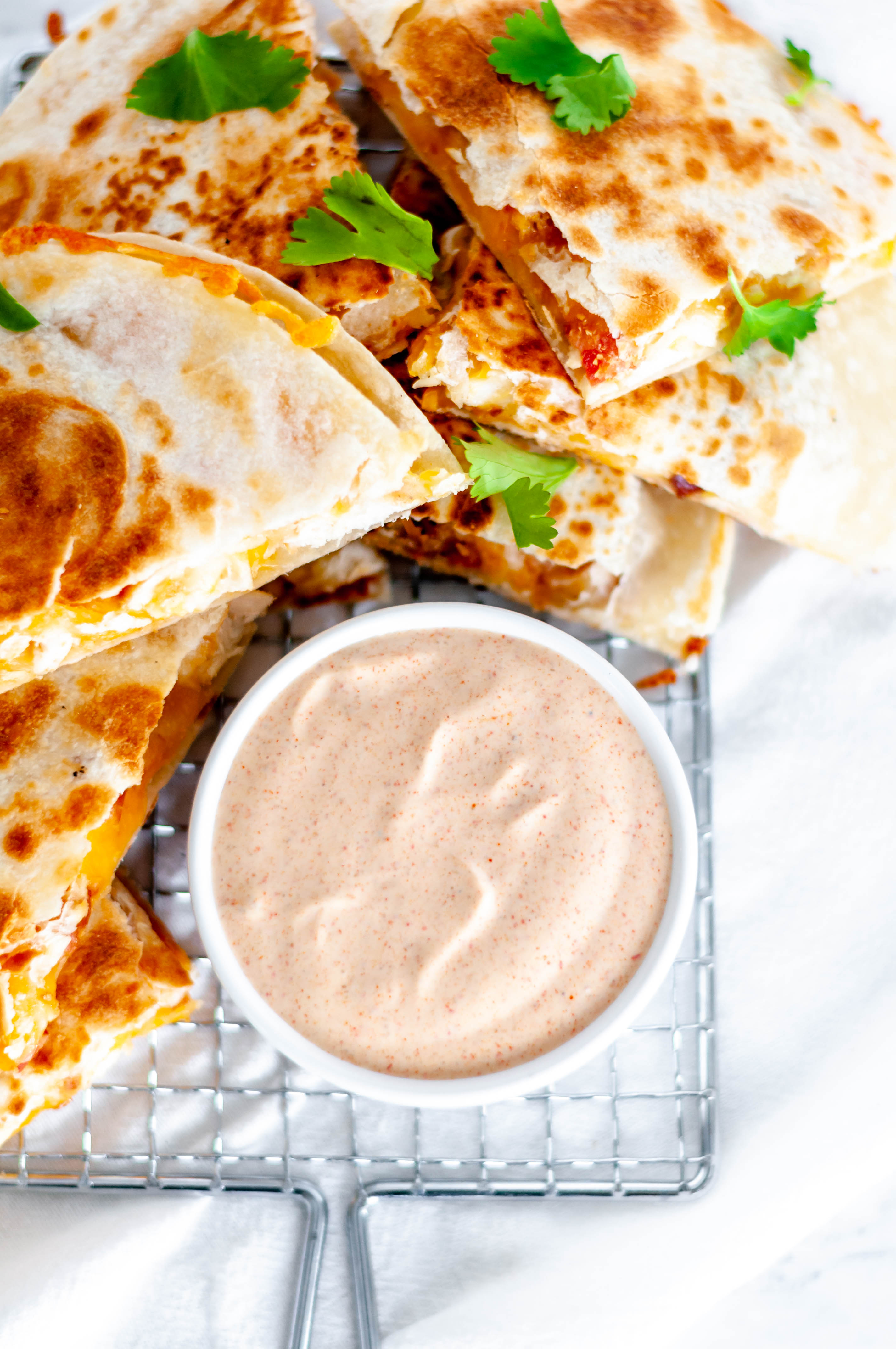 This copycat Taco Bell Quesadilla Sauce is just like the real deal and so simple to make at home. Spice up your favorite quesadilla with this yummy sauce.