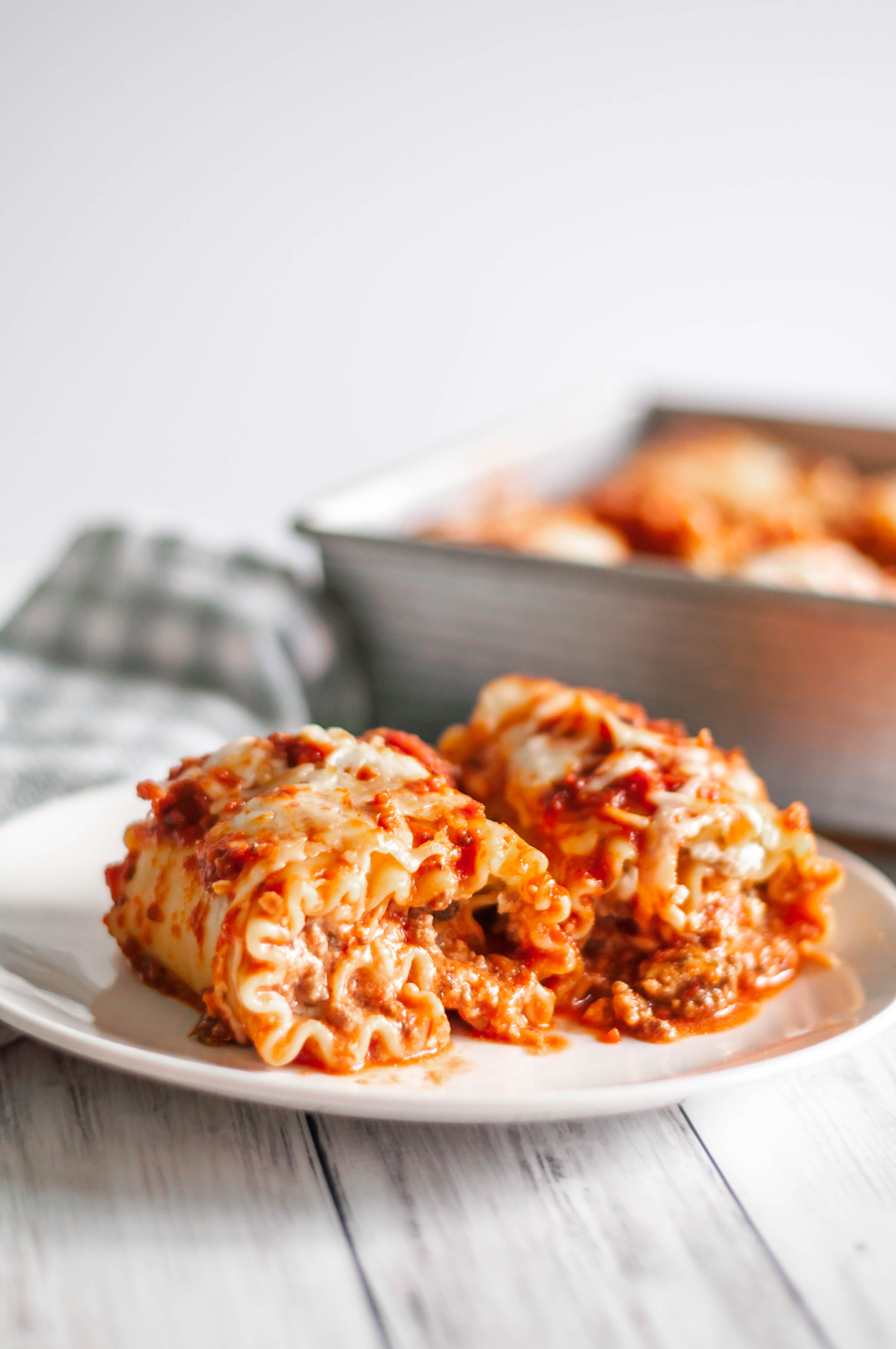 Lasagna Roll Ups are the perfect way to get all that classic lasagna flavor in less than half the time. Perfect for weeknights and freezer friendly.