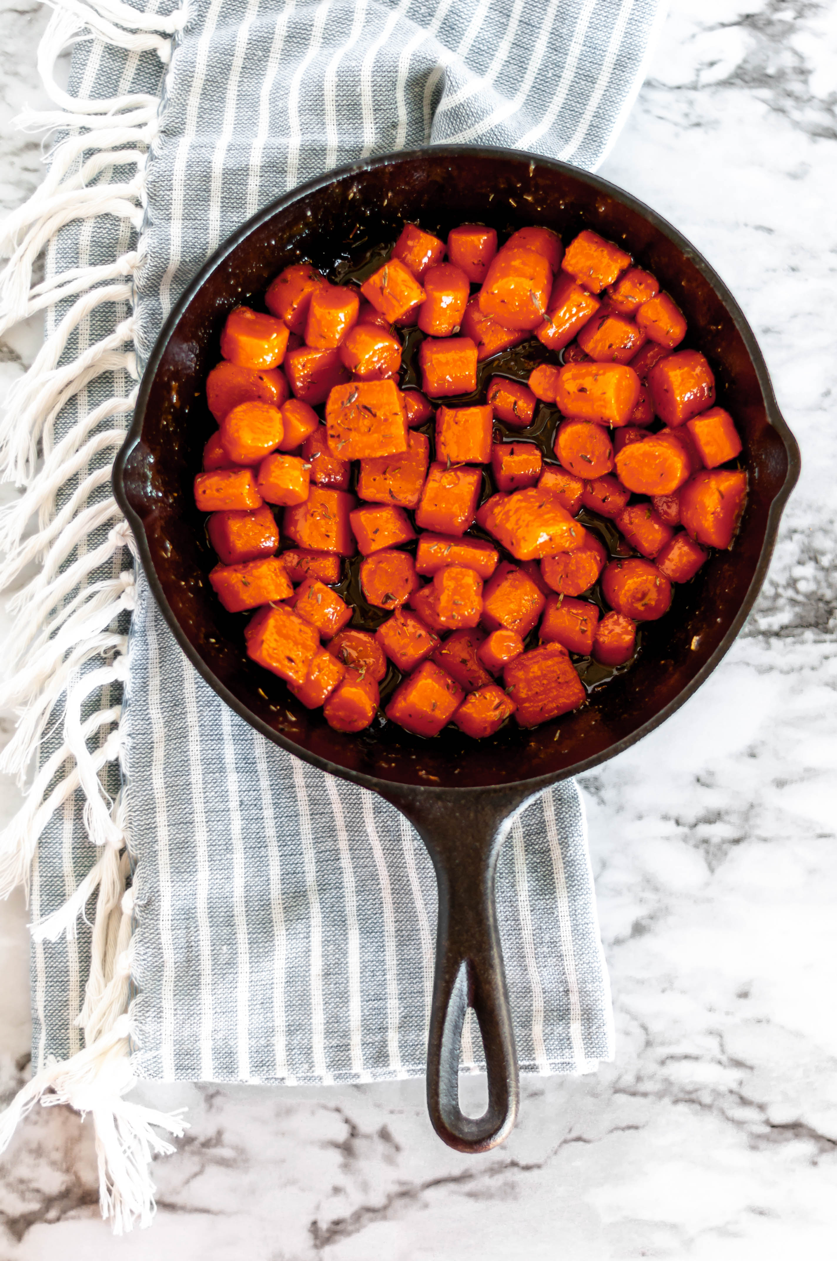 Stovetop Honey Butter Carrots are the most delicious simple, humble addition to your Thanksgiving table. Made completely on the stovetop, freeing up that precious oven space. Low maintenance and only 30 minutes to make.