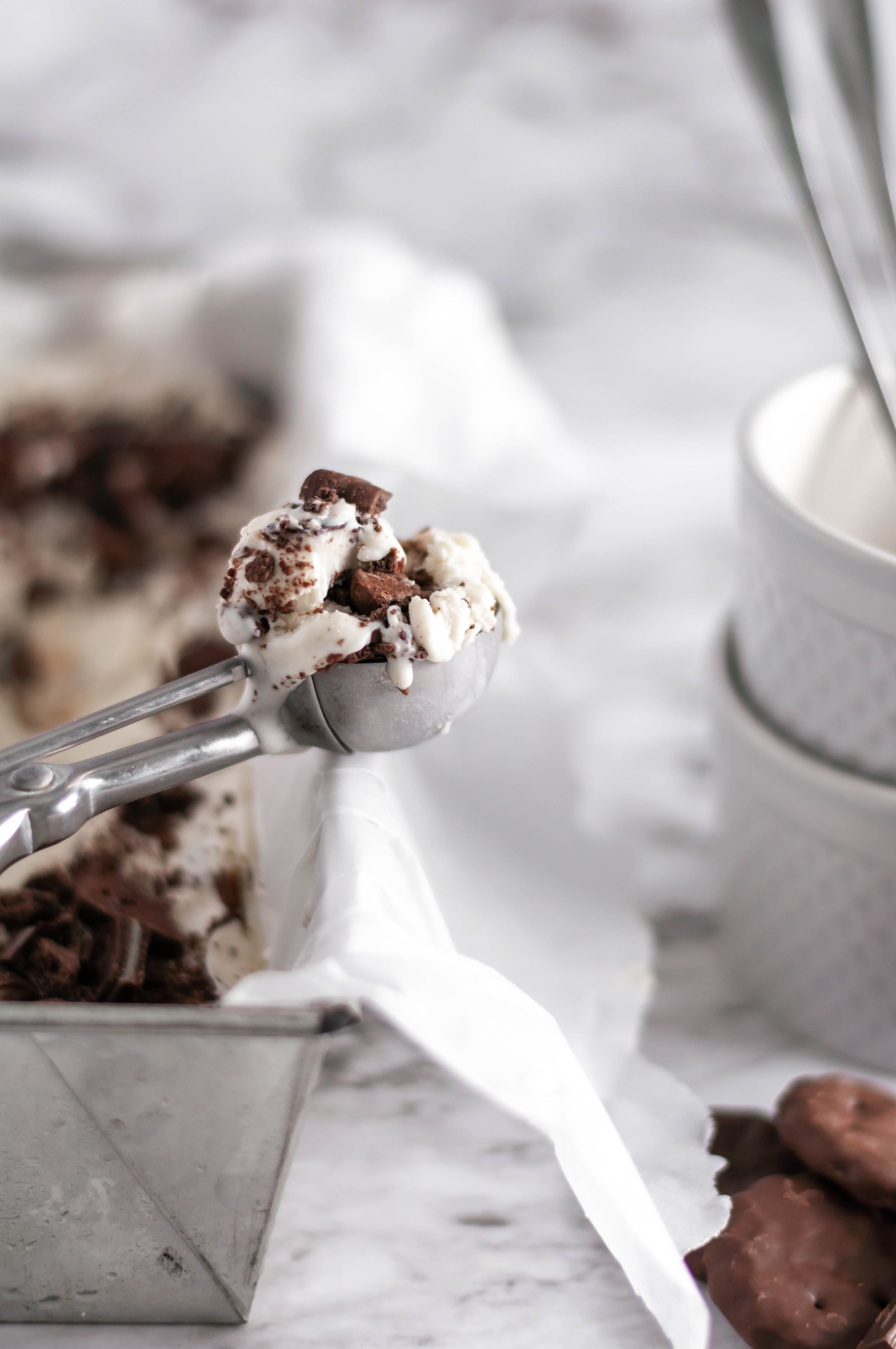 For an epic holiday dessert, break out the ice cream maker and whip up this Triple Mint Ice Cream. Creamy vanilla ice cream with three mint mix ins, grasshopper cookies, Andes mint candies and York Peppermint Patties.