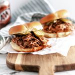 Rootbeer BBQ Pulled Pork Sandwiches are super simple to make in the slow cooker. Four ingredients & hours in the slow cooker to tender, saucy perfection.