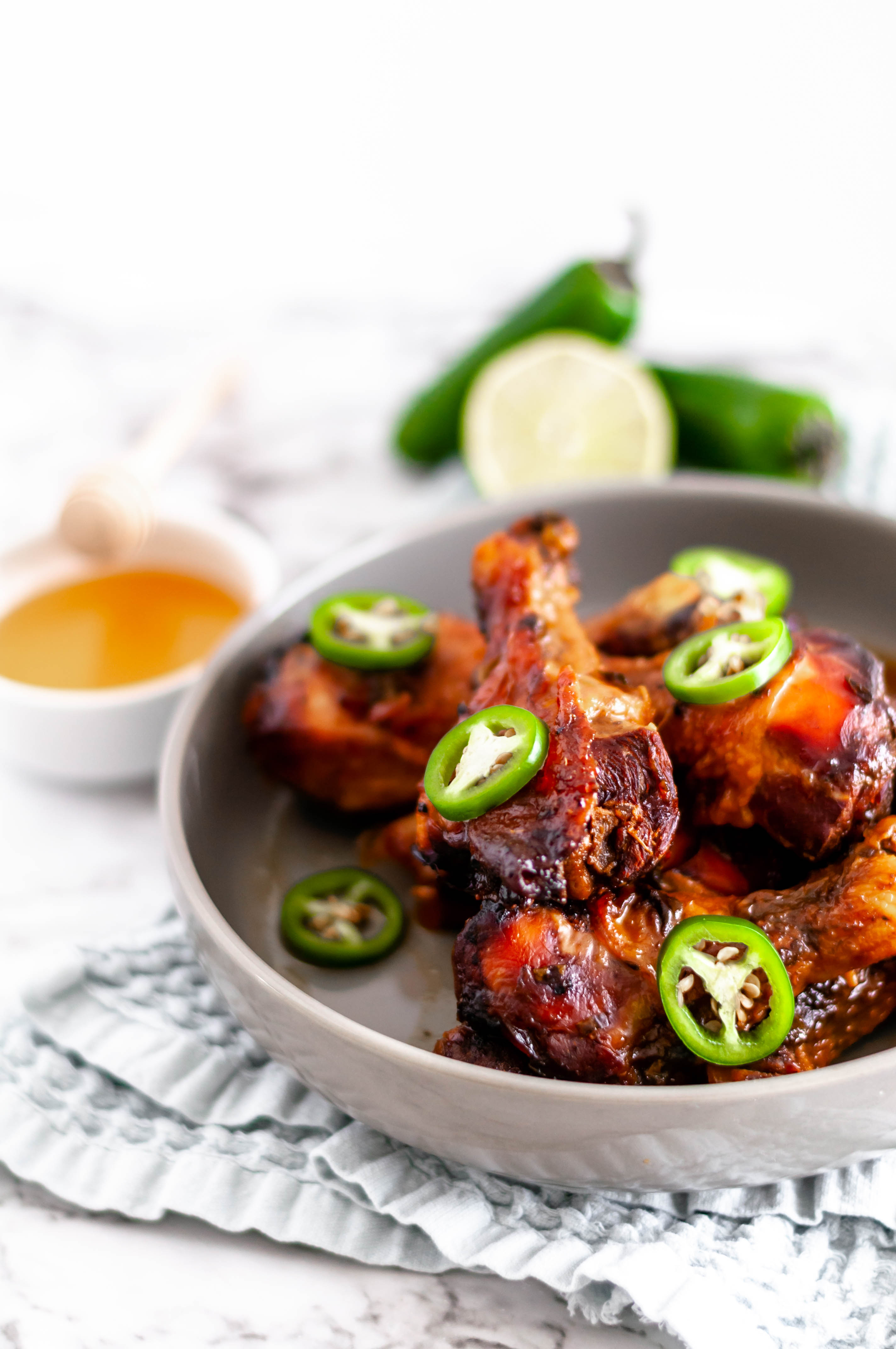 This Slow Cooker Honey Jalapeno Chicken Drumsticks are perfect for busy weeknights. Just a few ingredients tossed into the slow cooker & dinner is served.