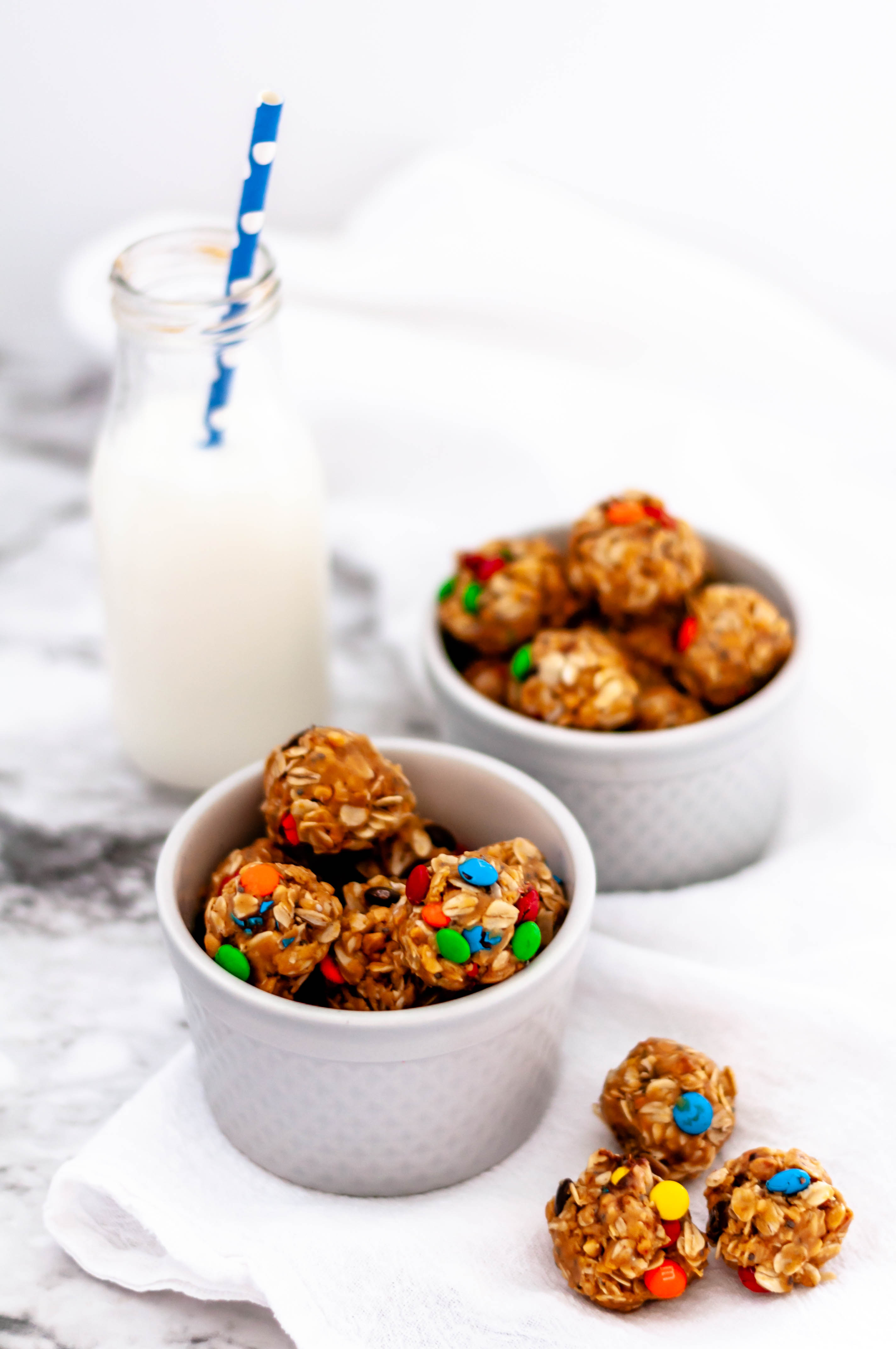 Monster Cookie Energy Balls are a simple, healthy snack that will fix your sweet tooth without wrecking healthy eating habits. Tastes just like a monster cookie, but healthy.