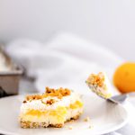 Buttery crust, tangy cream cheese and tart lemon pudding combine for the best spring or Easter dessert. Lemon Hush is simple to make and will please a crowd.