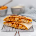 Meet your new craving, the Buffalo Chicken Crunch Wraps. Spicy buffalo chicken, mozzarella cheese, blue cheese and a crispy tostada shell all wrapped up in a soft flour tortilla and cooked to crispy perfection.