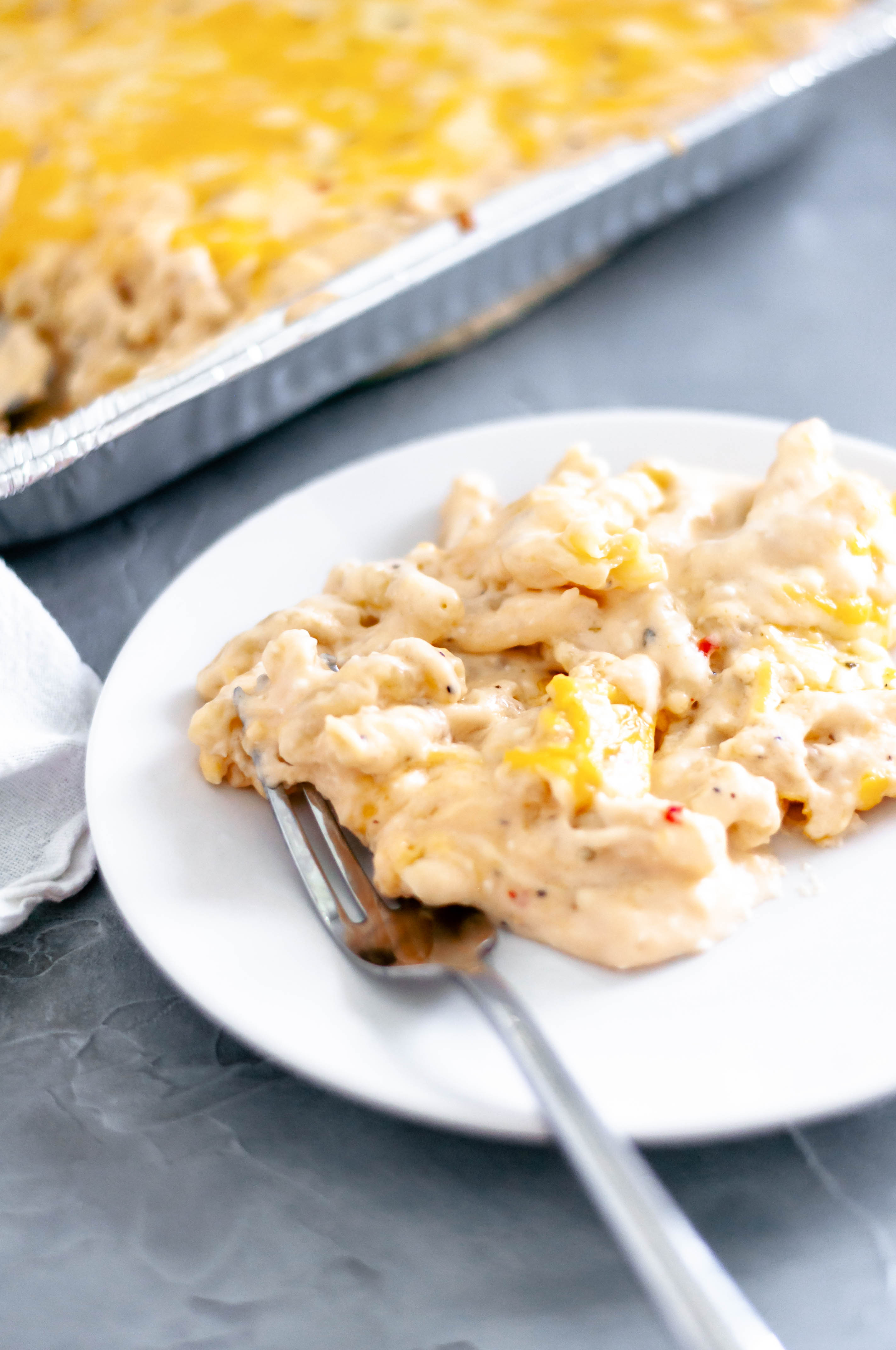 Your smoker doesn't have to be just for meat. This Smoked Macaroni and Cheese has a creamy, three cheese sauce that is tossed with pasta and smoked for a slightly smoky flavor.