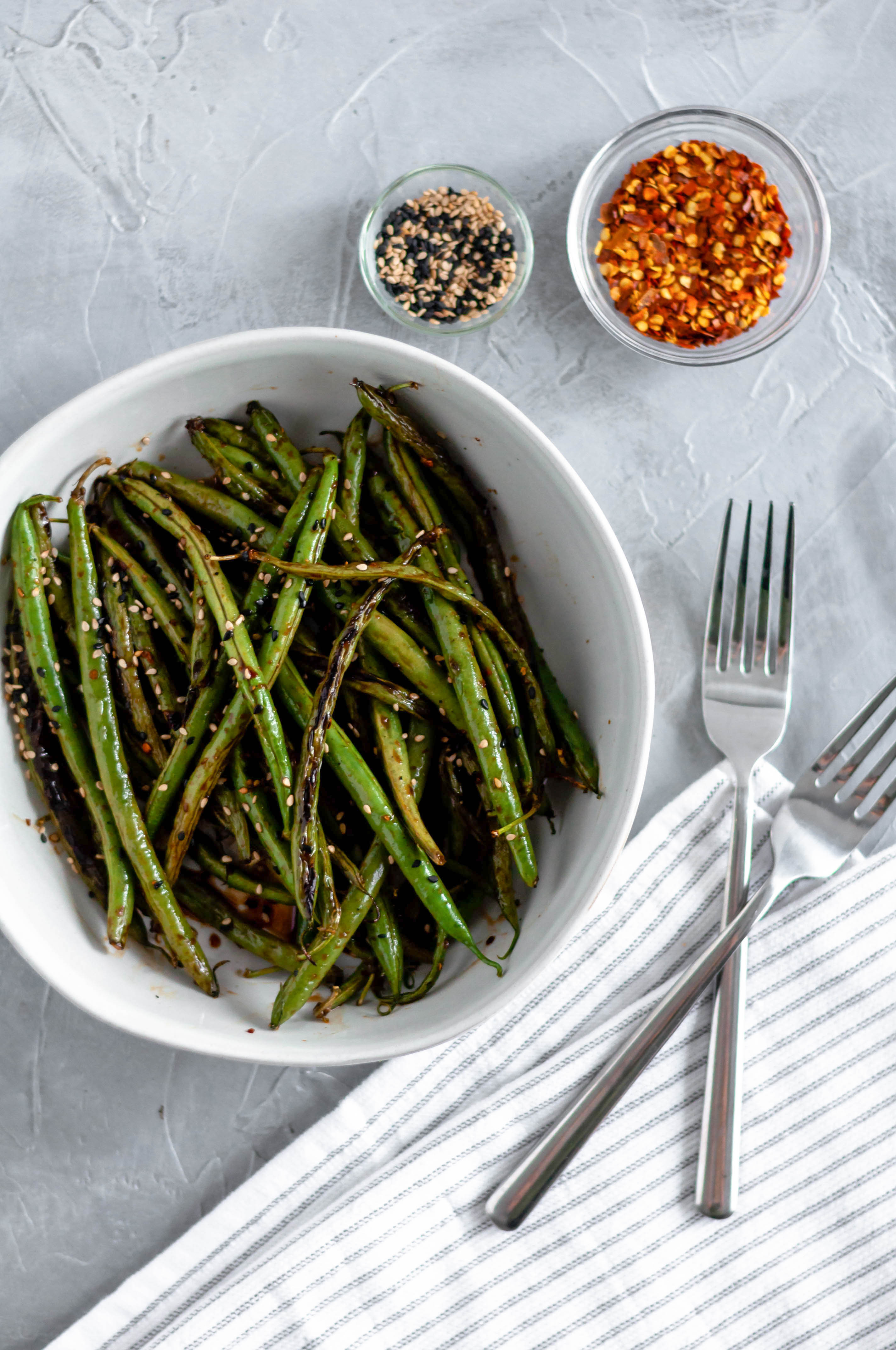 In need of a quick, simple and healthy side dish? These Asian Green Beans take minutes to make and are packed with flavor.