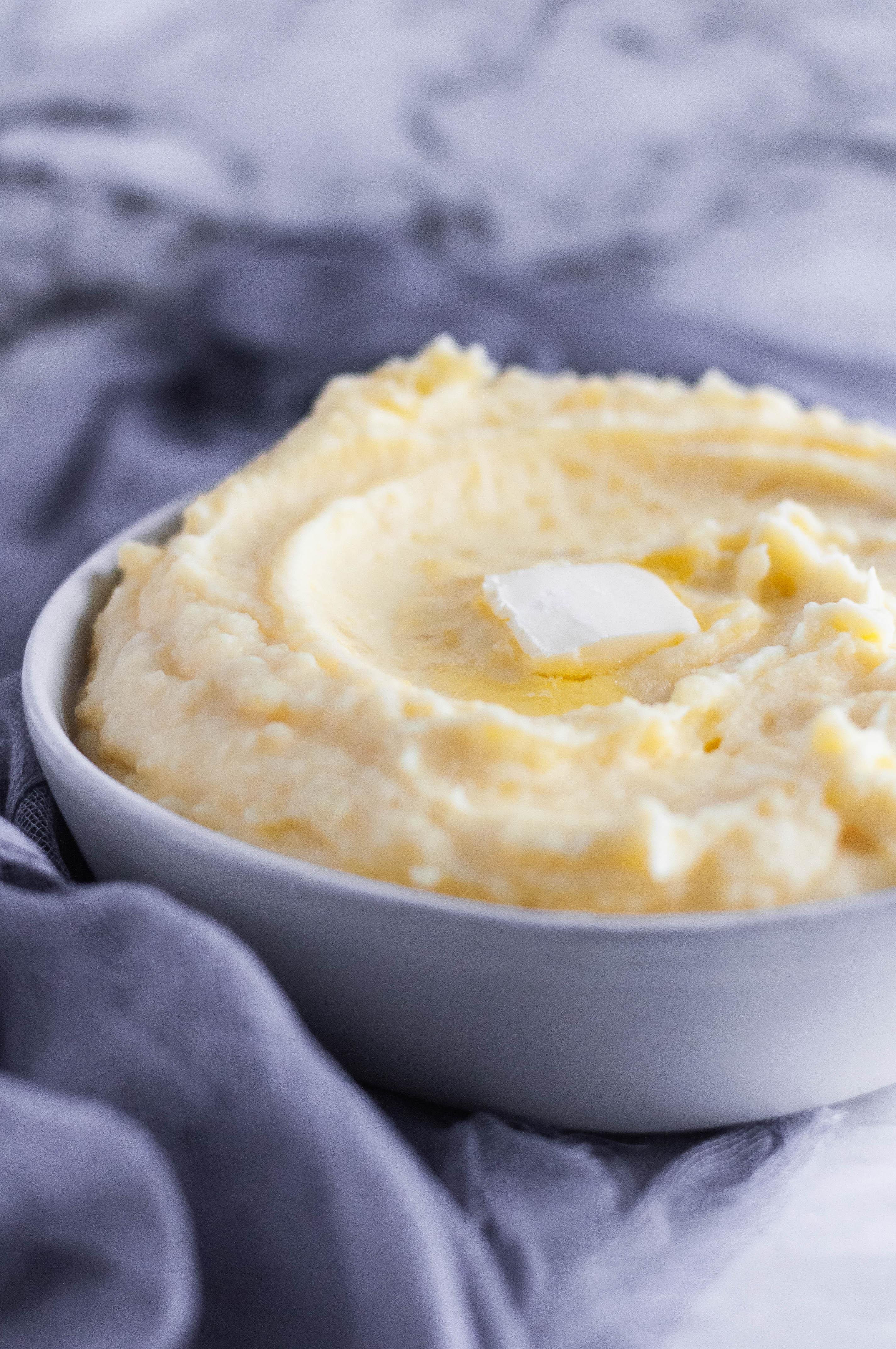 Save space on your stove top with these Instant Pot Mashed Potatoes for your next holiday dinner. Just as creamy and delicious as ever. Perfect for Thanksgiving dinner.