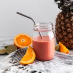 Get all the flavors of rainbow sherbet without all the sugar with this Rainbow Sherbet Smoothie. Fresh orange, lime juice, frozen raspberries and pineapple along with raspberry Greek yogurt all come together to make this incredibly fruity, healthy smoothie.