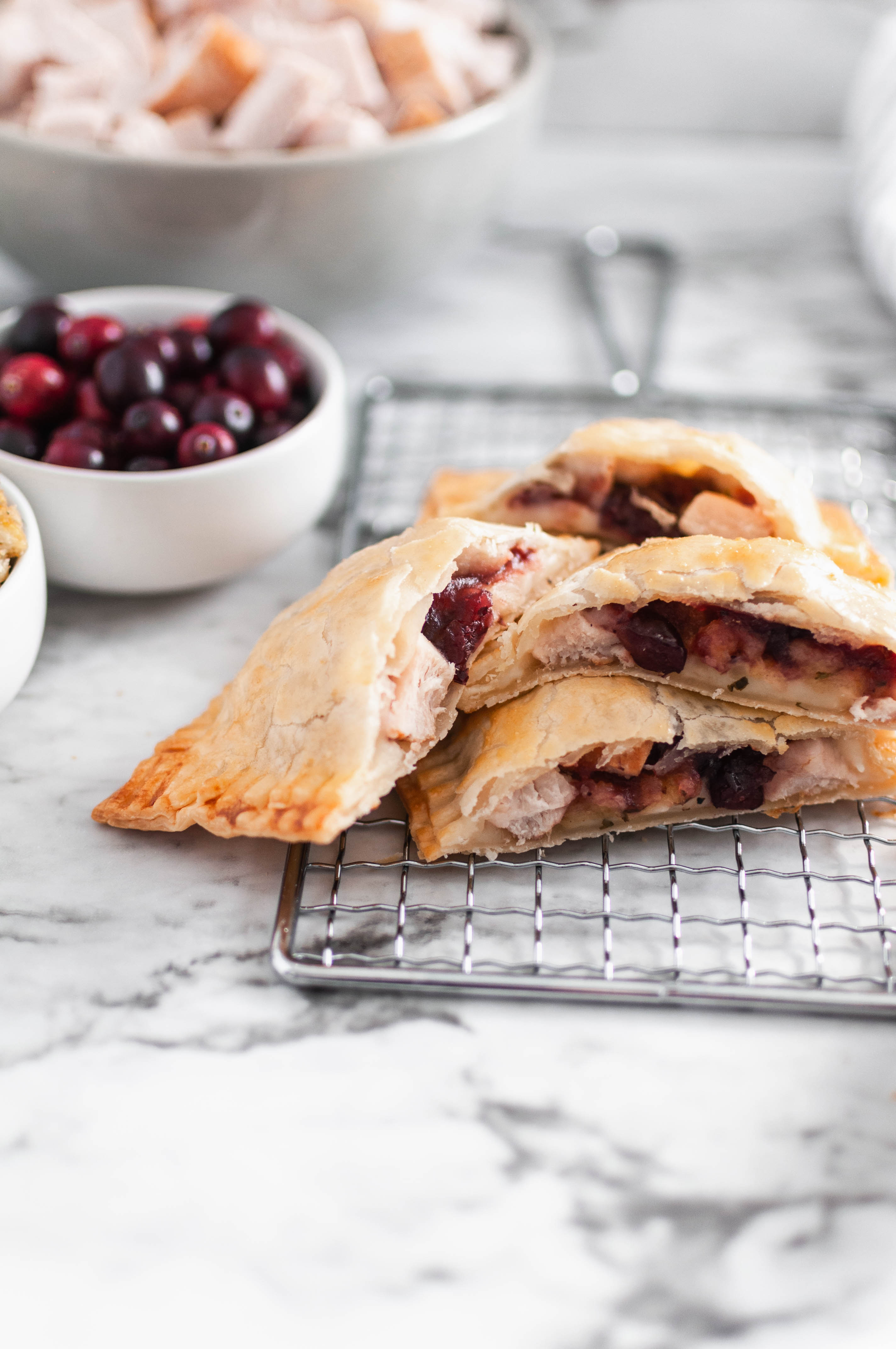 Repurpose your delicious Thanksgiving leftovers and make these Thanksgiving Leftovers Hot Pockets. I've teamed up with the National Turkey Federation to bring you a turkey-licious recipe that you'll love this fall and all year long. Mashed potatoes, stuffing, cranberry sauce and turkey cooked in flaky pie dough to golden perfection.