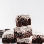 These dense, rich Cookies and Cream Brownies are the ultimate chocolate dessert. Thick, cookie studded brownies with cookies and cream buttercream.