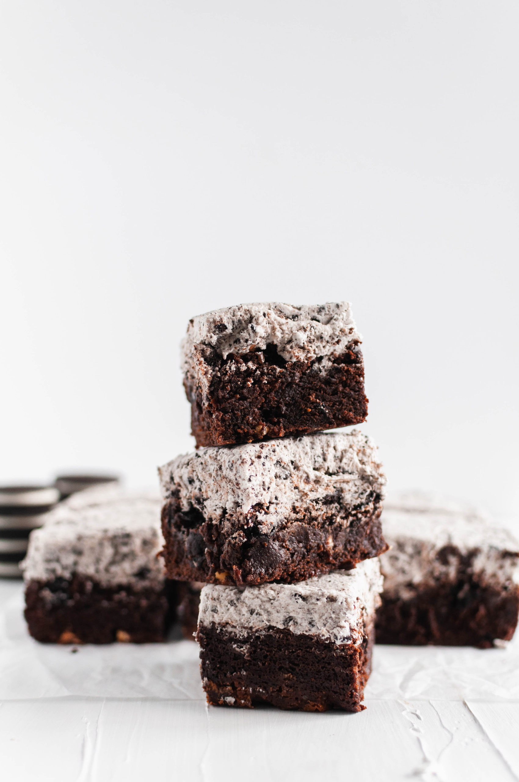 These dense, rich Cookies and Cream Brownies are the ultimate chocolate dessert. Thick, cookie studded brownies with cookies and cream buttercream.