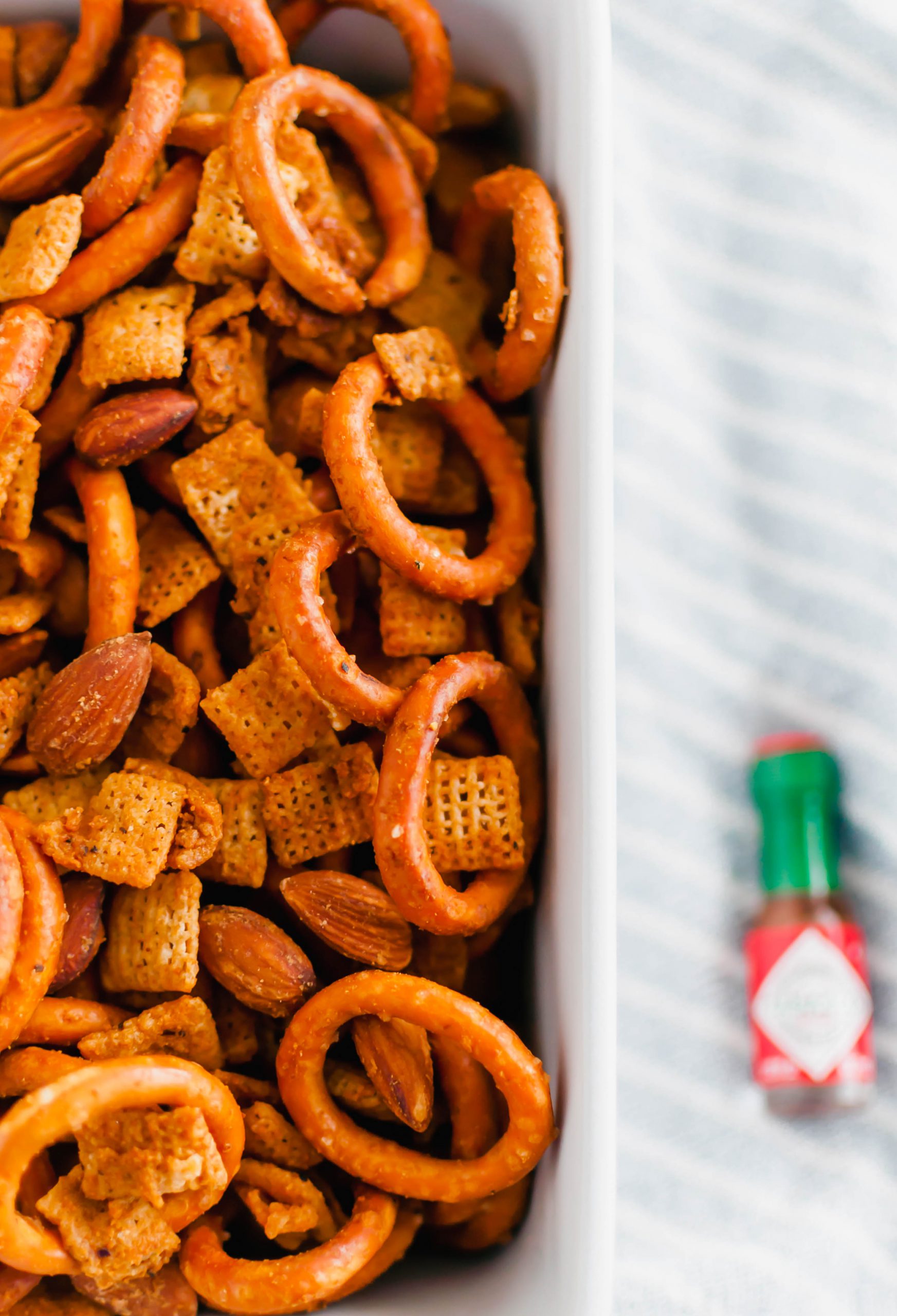 Need to add a little spice to your holidays? This Spicy Chex Mix is just what you need for snacking.