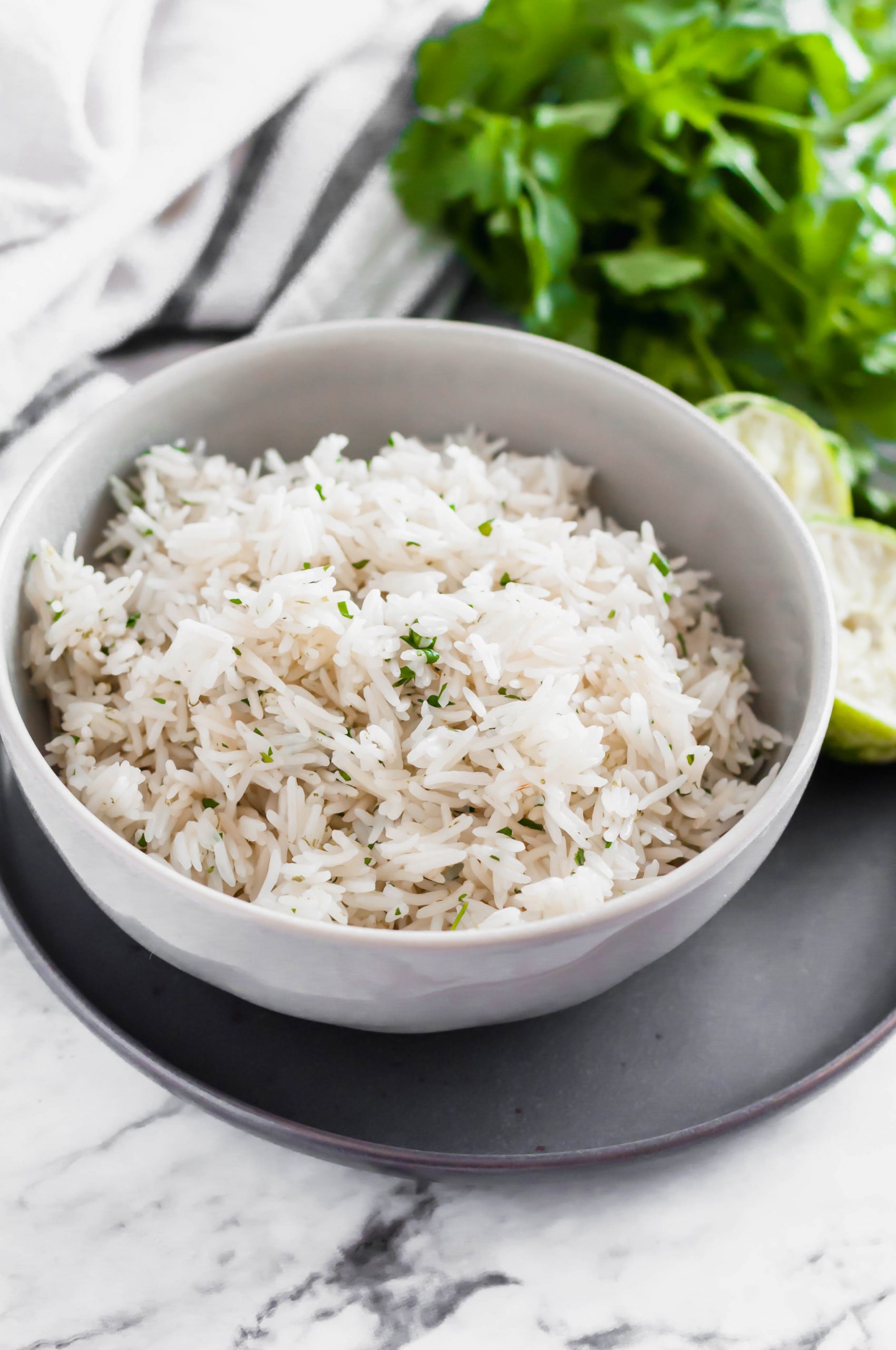 Instant Pot Cilantro Lime Rice couldn't get easier with 3 ingredients and a 4 minute cook time. Super flavorful and perfect with any Mexican meal.