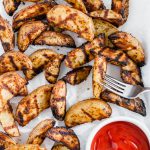 Grilled Potato Wedges are the perfect summer side dish. Done in less than 30 minutes and packed with chargrilled flavor. Great with burgers and chicken.