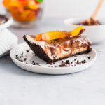Dirt and Worms Ice Cream Pie is a fun way to treat the kids on these hot summer days. Cookies and cream ice cream, hot fudge and gummy worms with an Oreo crust make up this super fun dessert.
