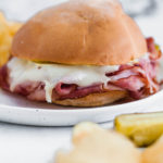 Need an easy lunch or weeknight meal? These Hot Ham and Cheese Sandwiches are the perfect solution. Shaved deli ham (honey ham is my favorite) with melted swiss cheese and a yummy sauce.