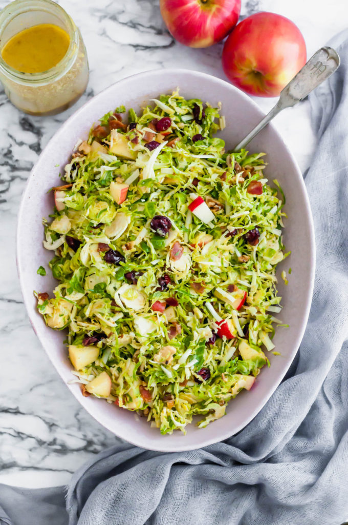 This Shaved Brussels Sprouts Salad is the perfect addition to your Thanksgiving table. It's bringing all the fresh fall vibes.