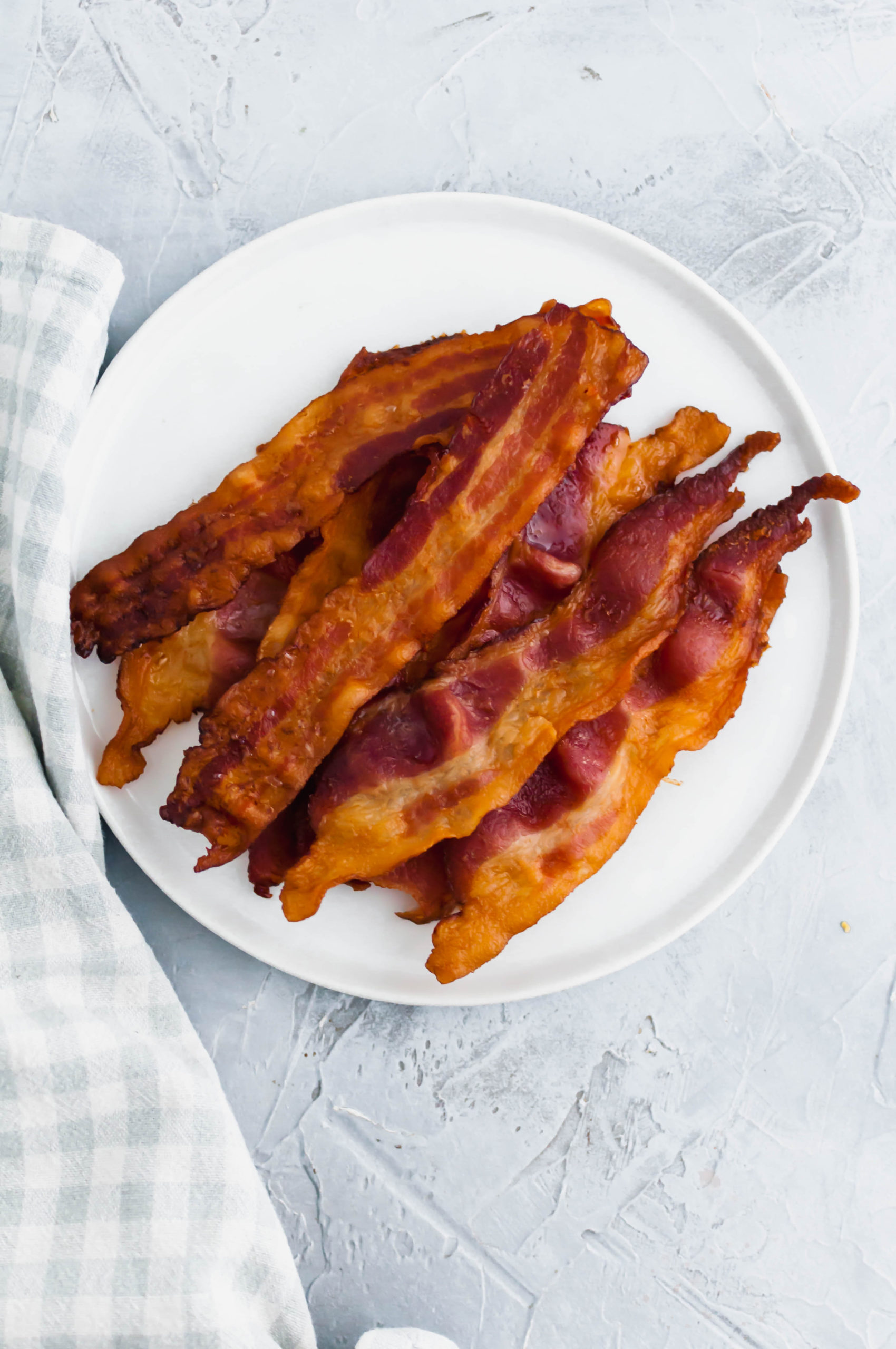 Today we're going to talk about How to Bake Bacon. It's the easiest and least messy way to prepare bacon and therefore my favorite.