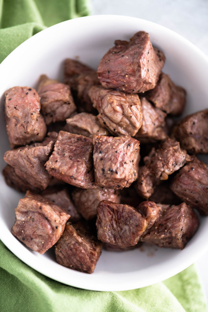Whether you need a quick appetizer or dinner, these Air Fryer Steak Bites will save the day. Done in minutes and super tender.