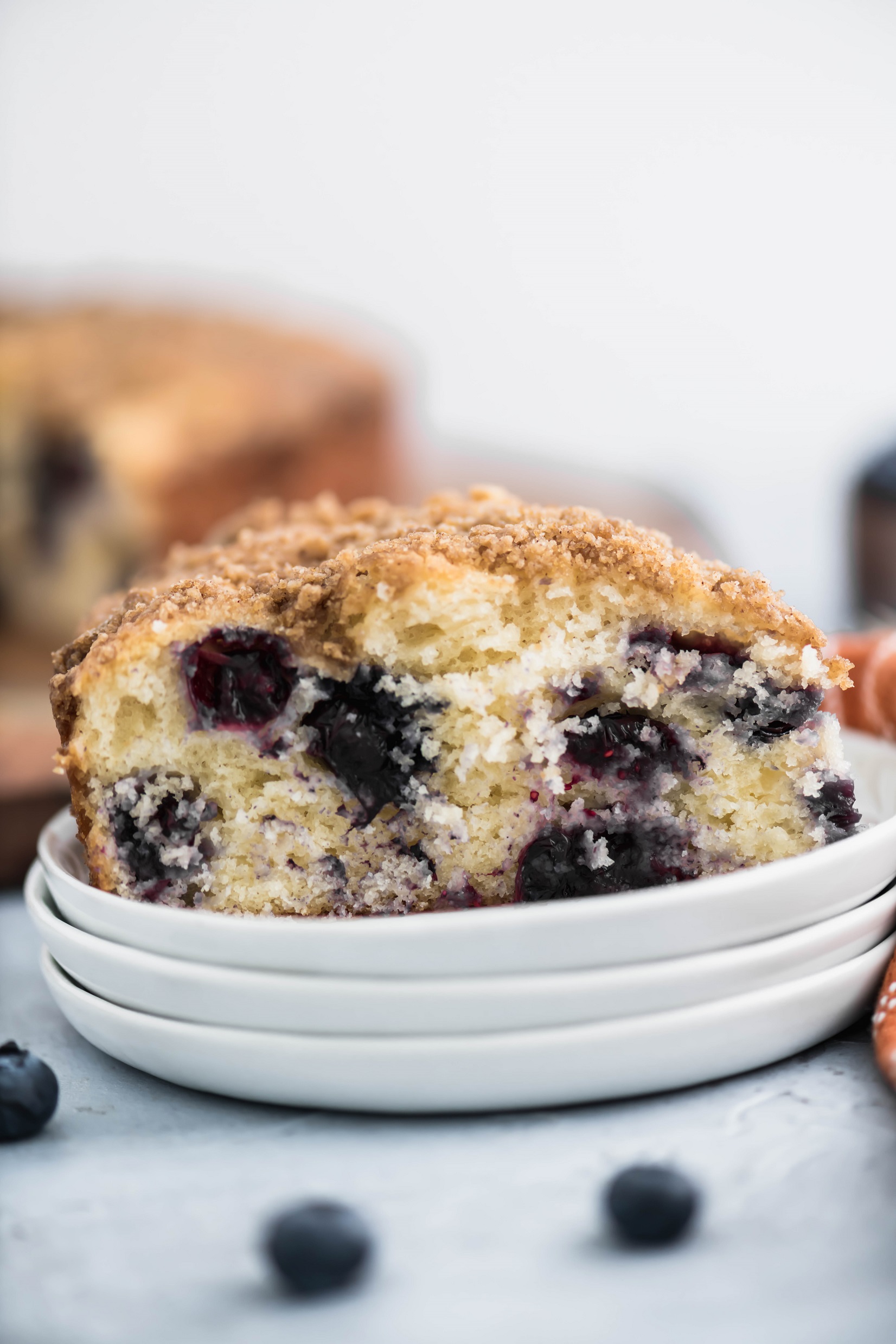 Blueberry Yogurt Coffee Cake is bursting with fresh, juicy blueberries and topped with sweet, crunchy streusel. Greek yogurt makes it perfectly moist.