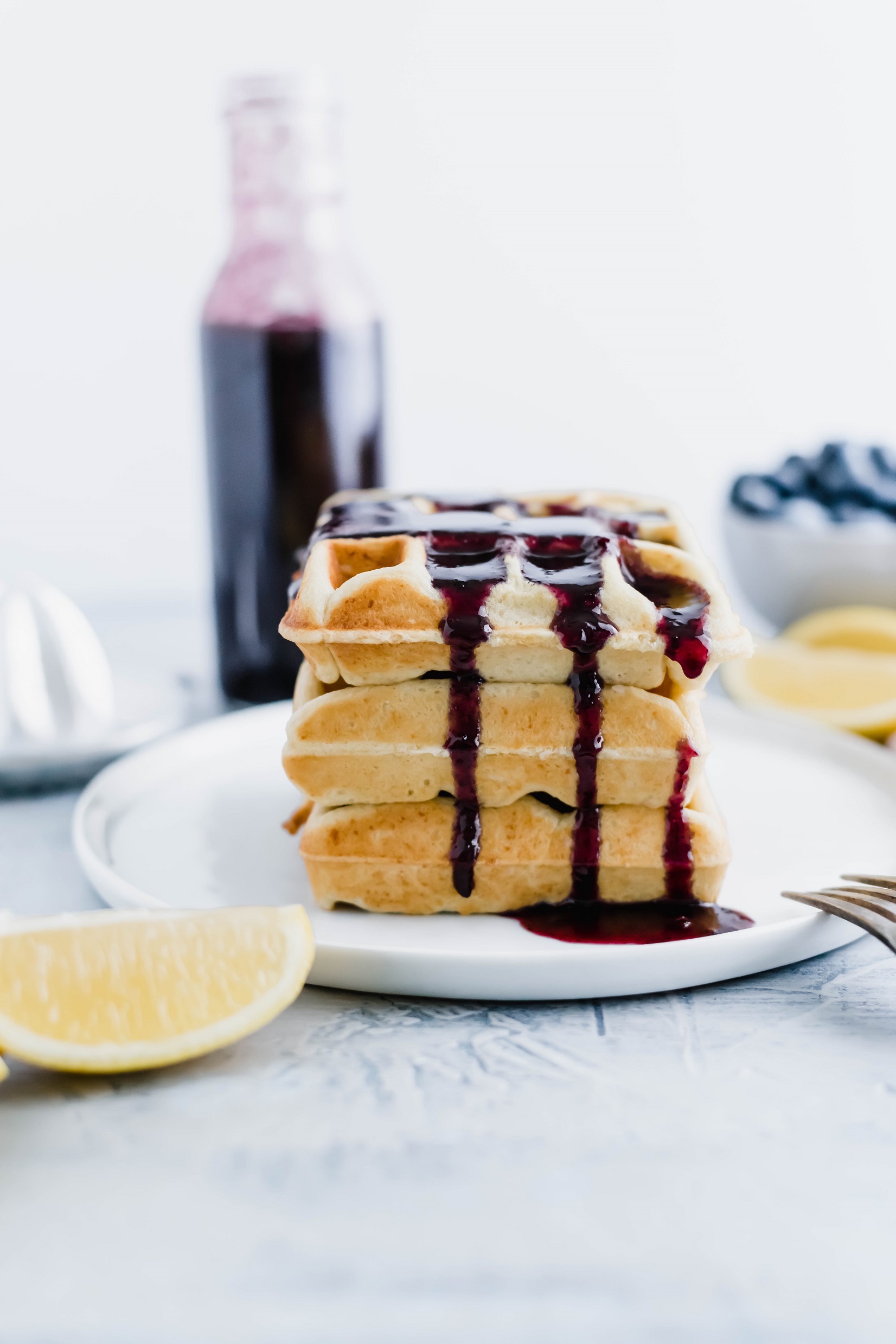 Let me introduce you to a new spring breakfast favorite, Lemon Ricotta Waffles. Fluffy, tender and packed full of zingy lemon flavor.