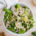 Make your favorite salad at home with this recipe for Panera's Asian Sesame Chicken Salad. It tastes JUST like the restaurant version at a fraction of the cost.