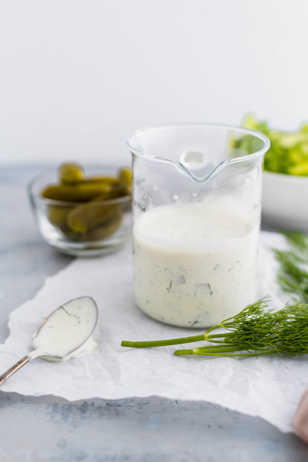 Dill Pickle Ranch is the dressing you didn't know you needed. Packed full of chopped dill pickles and pickle juice, this dressing will be delicious on all your summer salads.