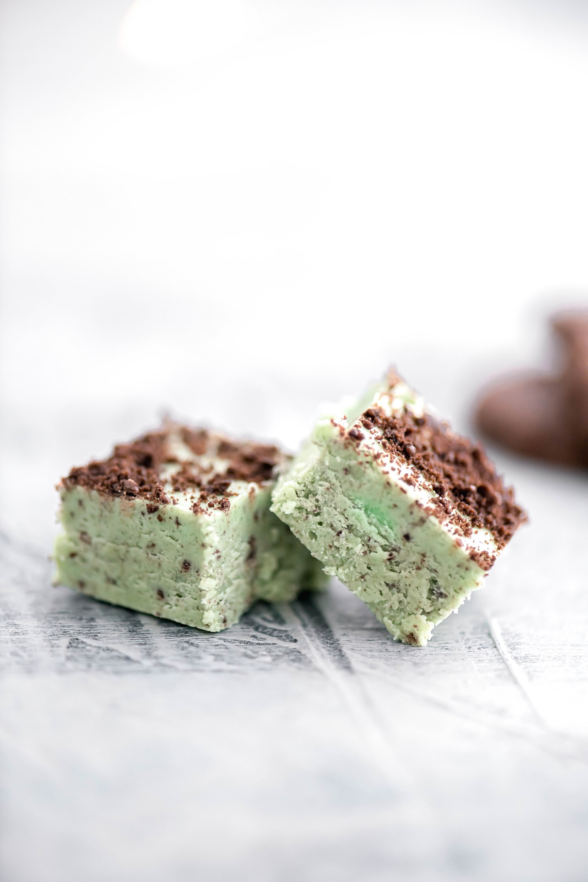 Close up of two pieces of grasshopper fudge.